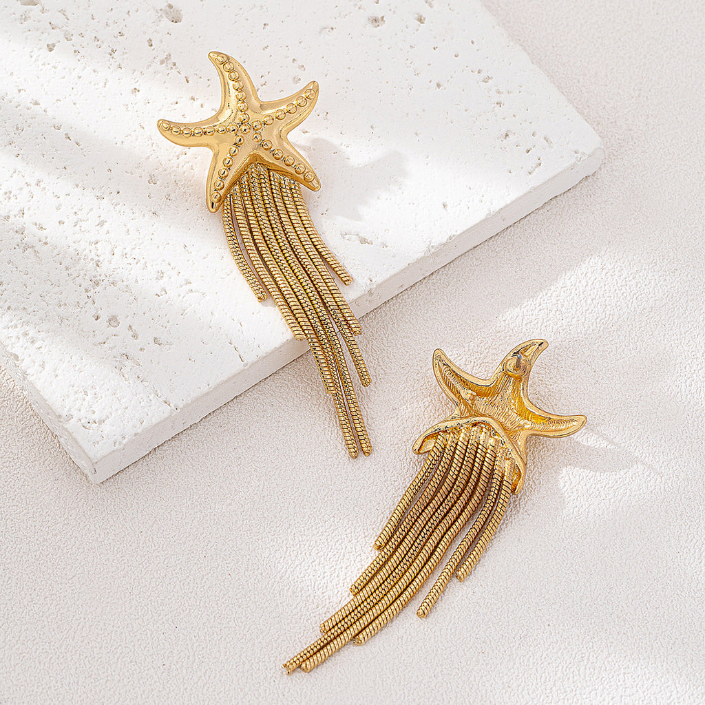 Pendientes con estrella dorada