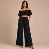 Lola - Conjunto top off-shoulder con volantes y pantalón palazzo