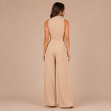 Alba - Mono halter con escote en V y lazo en la cintura