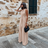 Alba - Mono halter con escote en V y lazo en la cintura