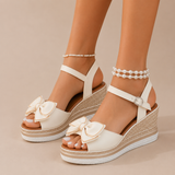 Nuria - Sandalias cuña con lazo y plataforma trenzada