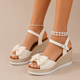 Nuria - Sandalias cuña con lazo y plataforma trenzada