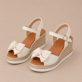 Nuria - Sandalias cuña con lazo y plataforma trenzada