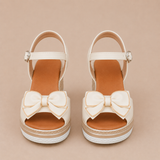 Nuria - Sandalias cuña con lazo y plataforma trenzada