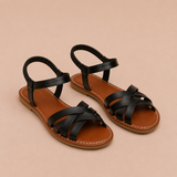 Vera - Sandalias planas con tiras cruzadas y tobillera elástica