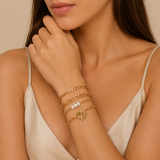 Conjunto de 4 pulseras elegantes doradas