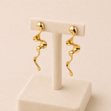 Pendientes serpiente irregular dorada