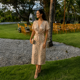 Laura - Vestido midi drapeado con nudo frontal