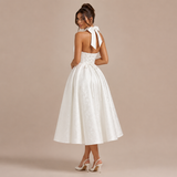 Ángela - Vestido midi halter con lazo y falda voluminosa