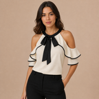 Lara – blusa fluida con volantes y acabado sofisticado