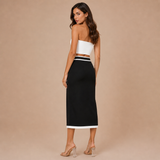 Leticia – falda midi estructurada con detalles en contraste y bolsillos decorativos