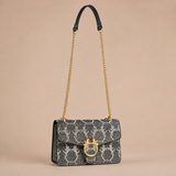 Maleta elegante con cadena dorada