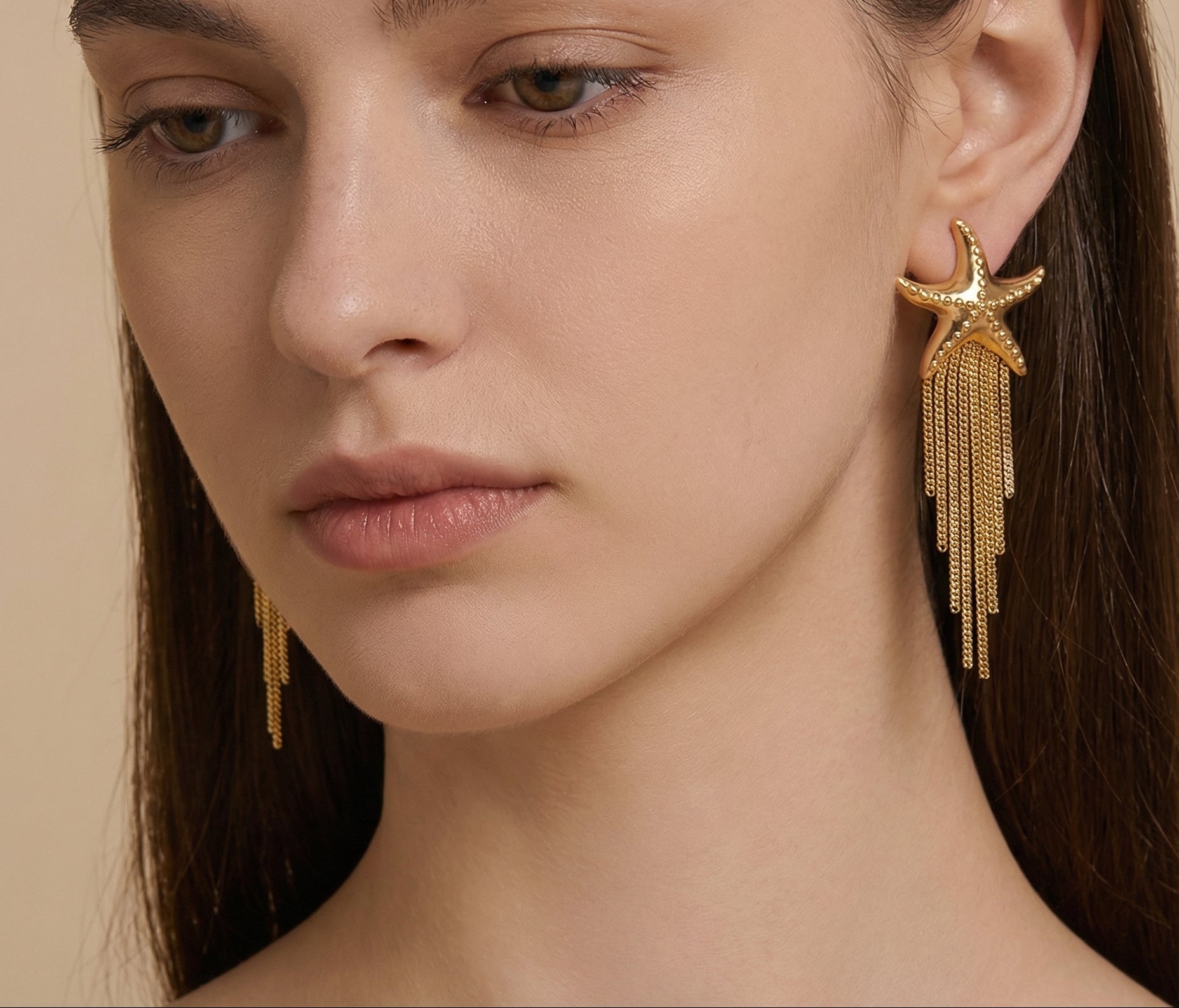 Pendientes con estrella dorada