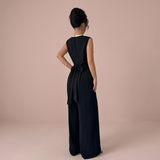 Iria – mono negro con detalle floral en contraste
